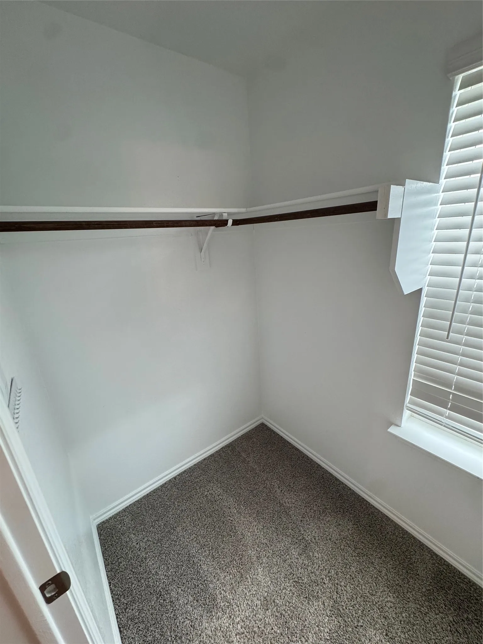 One side of Primary Closet