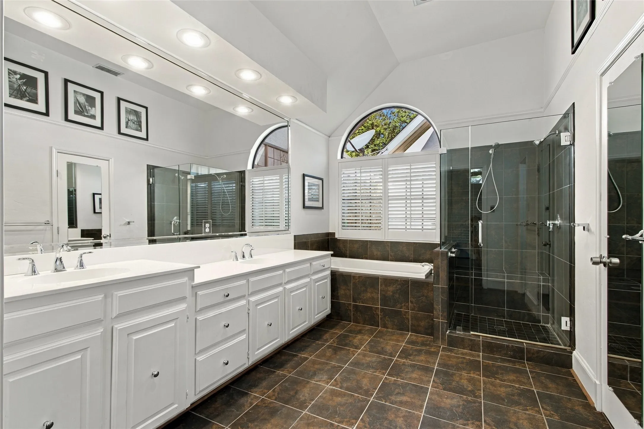 Dual sinks, tile flooring and separate shower & tub!