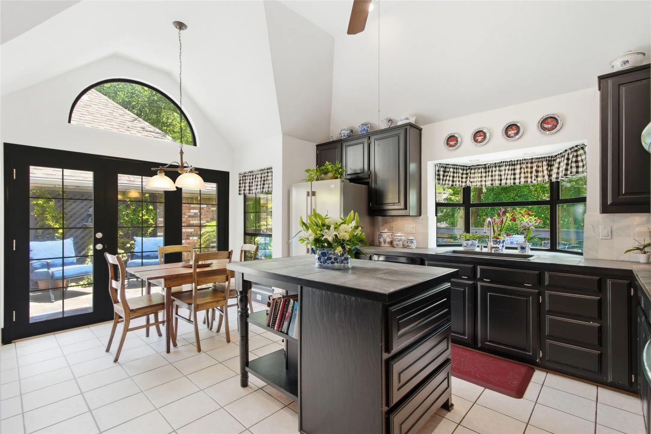 Kitchen with island, window above sink for views of greenspace!