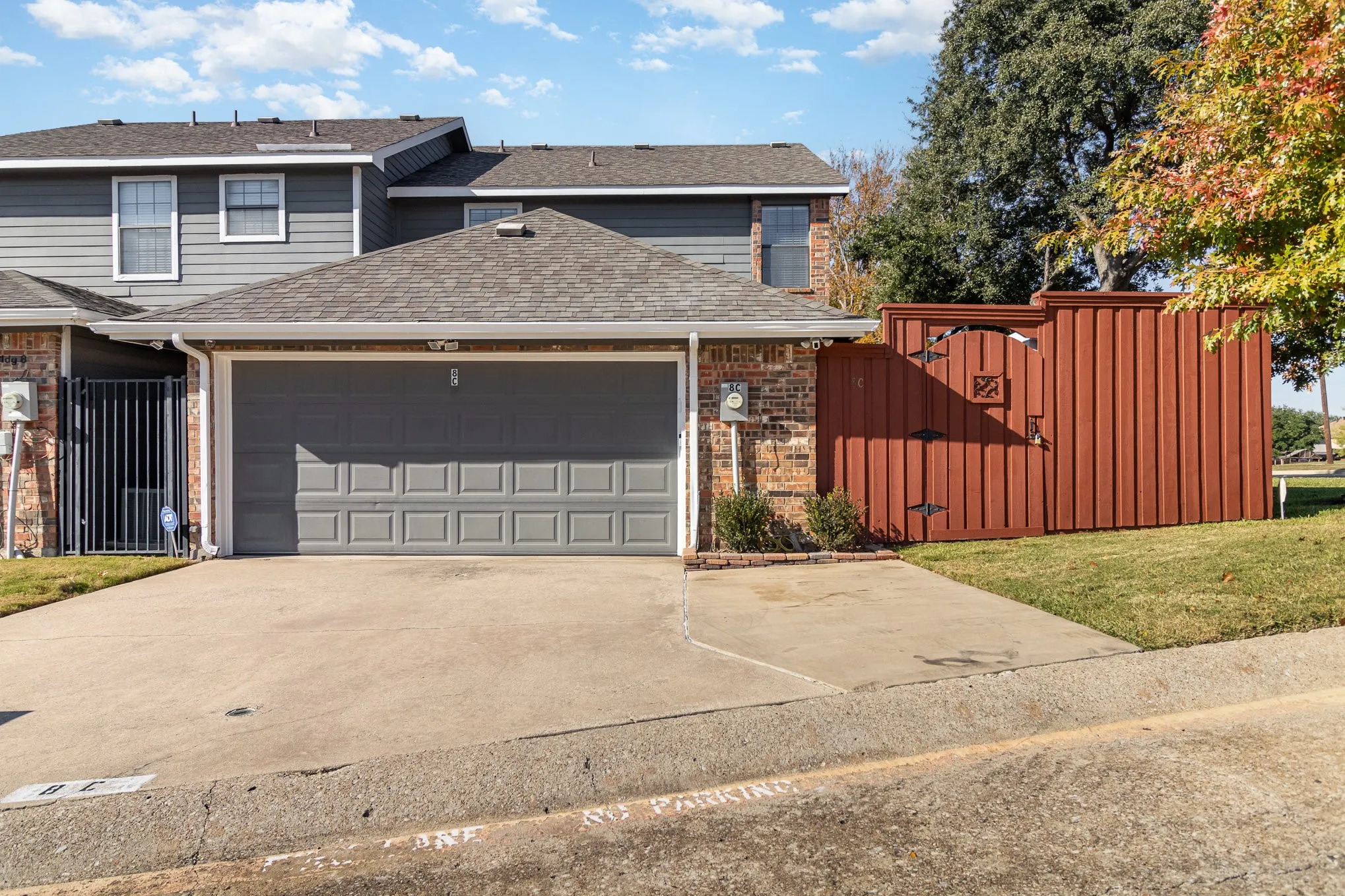 2-car garage has been updated with extra wall and ceiling insulation and has additional custom lighting. Floor is epoxy covered. Driveway has additional parking pad so that three full-size vehicles are easily accommodated.