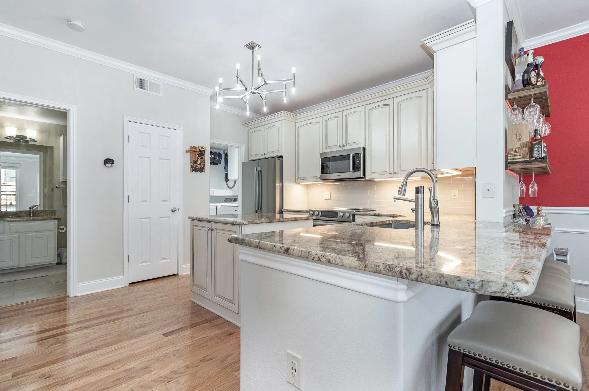 Kitchen has breakfast bar, state of the art Bosch appliances and spacious pantry.