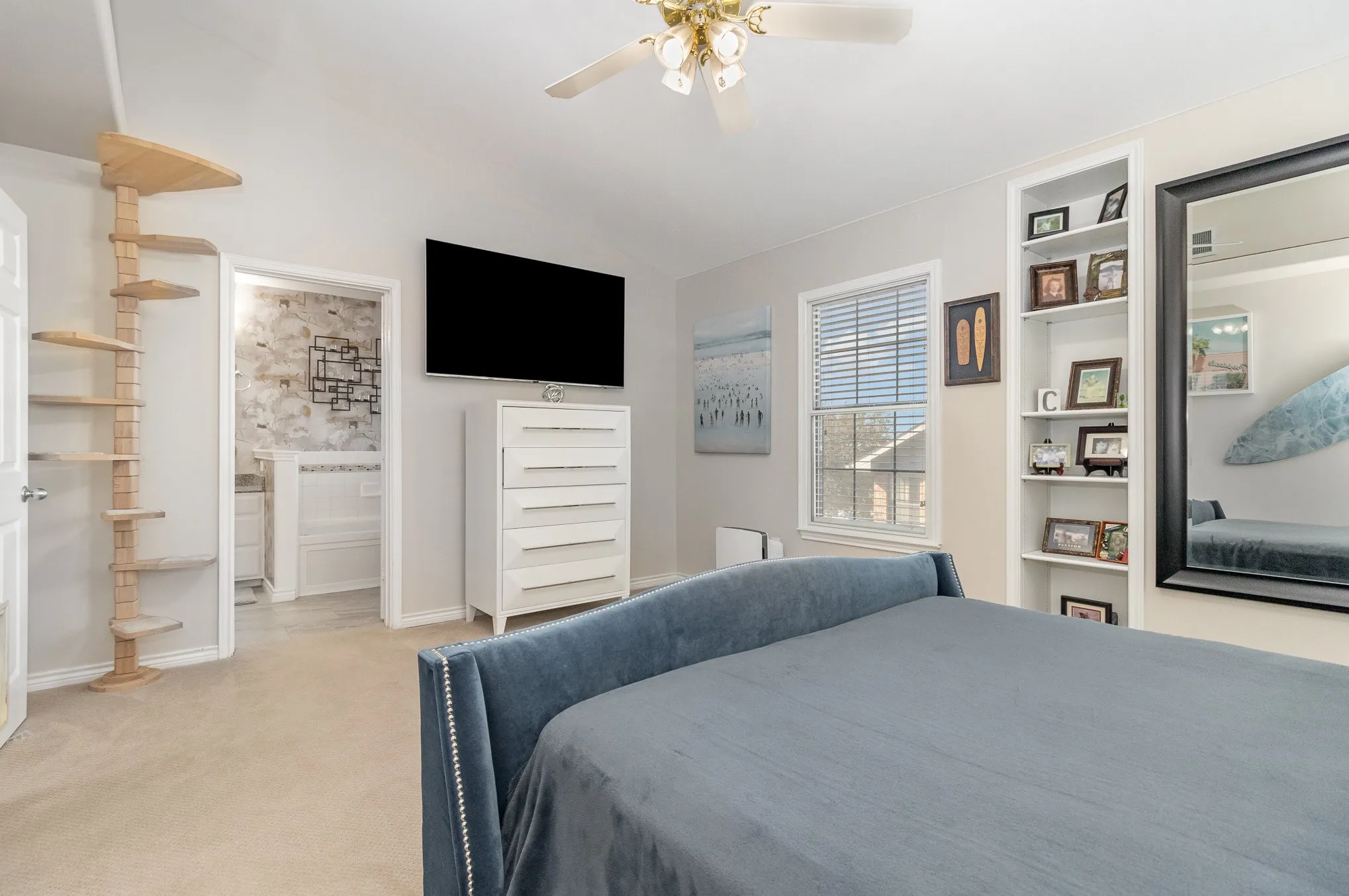 Plenty of wall space in this primary bedroom for your furnishings, plus enough wall space for TV!