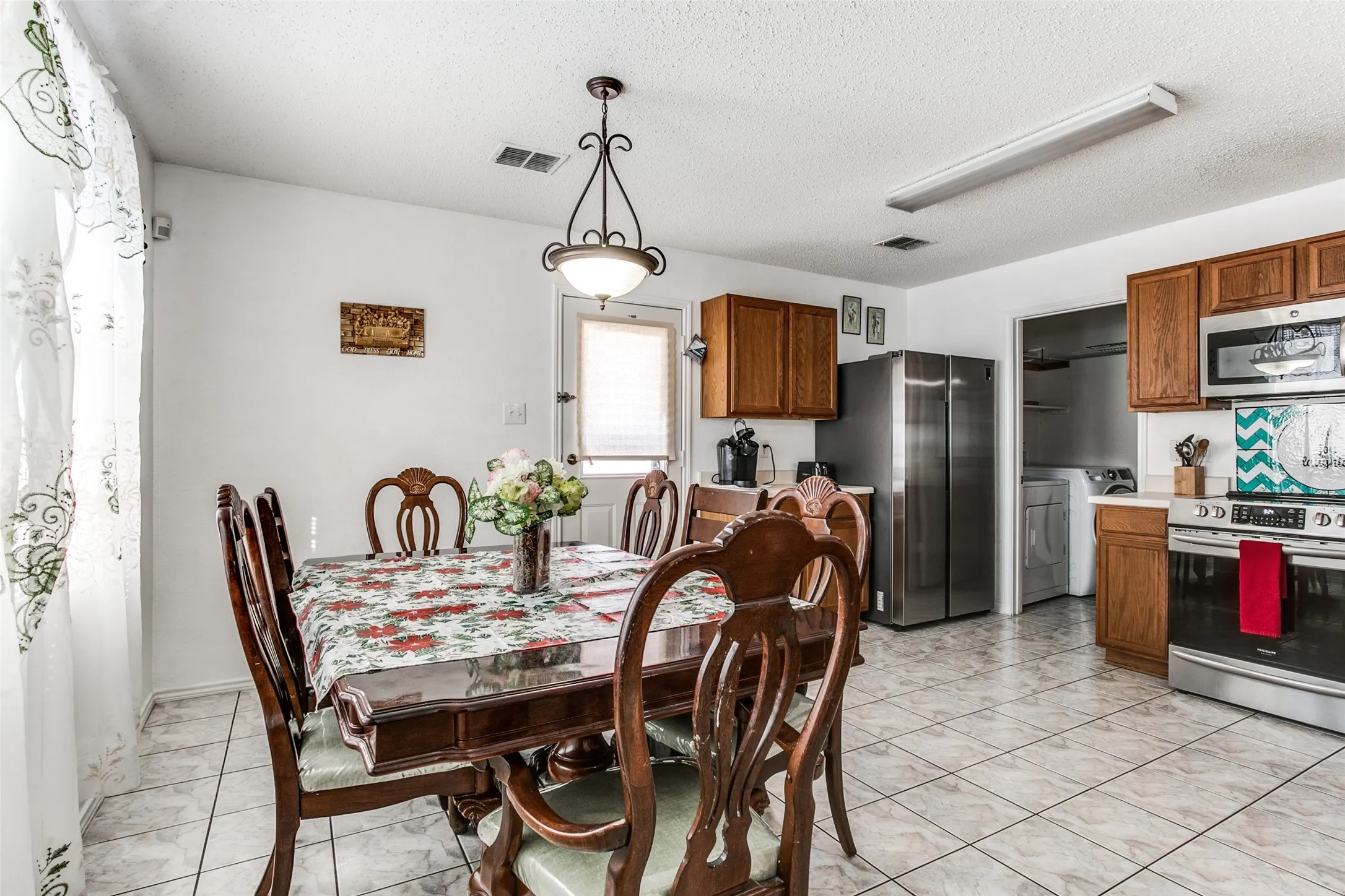 Previous photo of furnished and before flooring was updated.