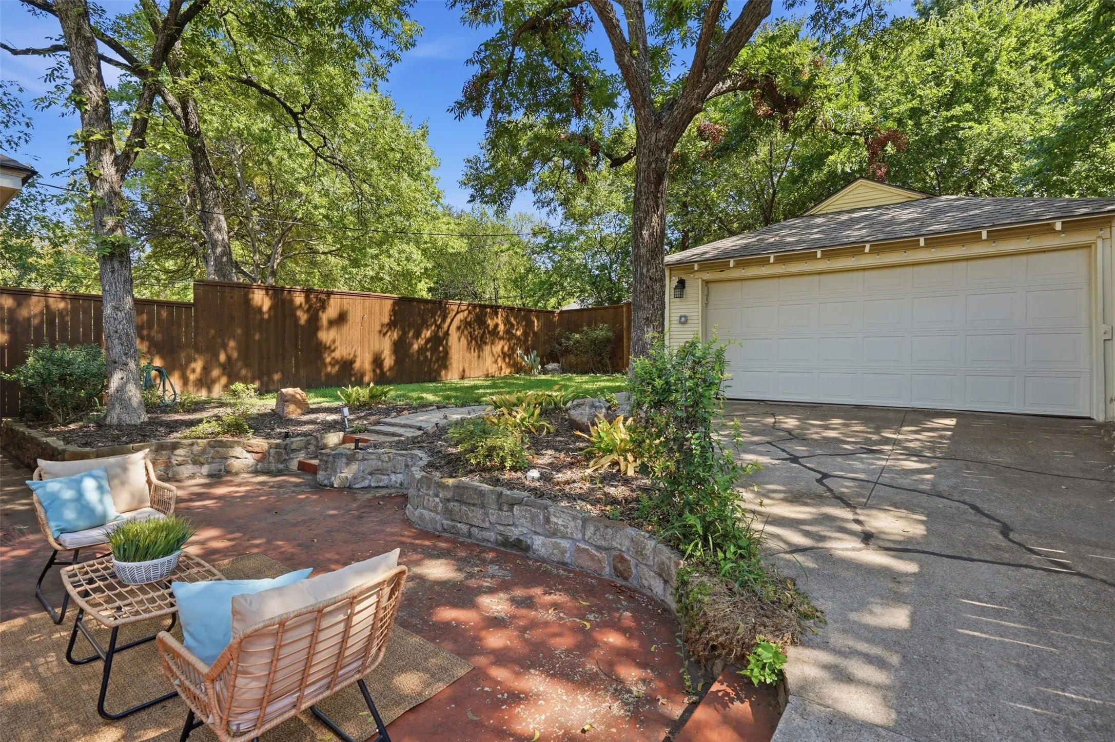 Landscaped backyard and 2-car garage.  Electric gate for gated parking.