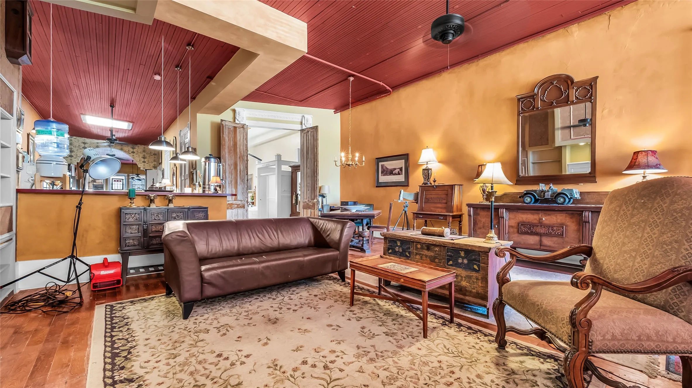 Wood-finish flooring with a textured area rug