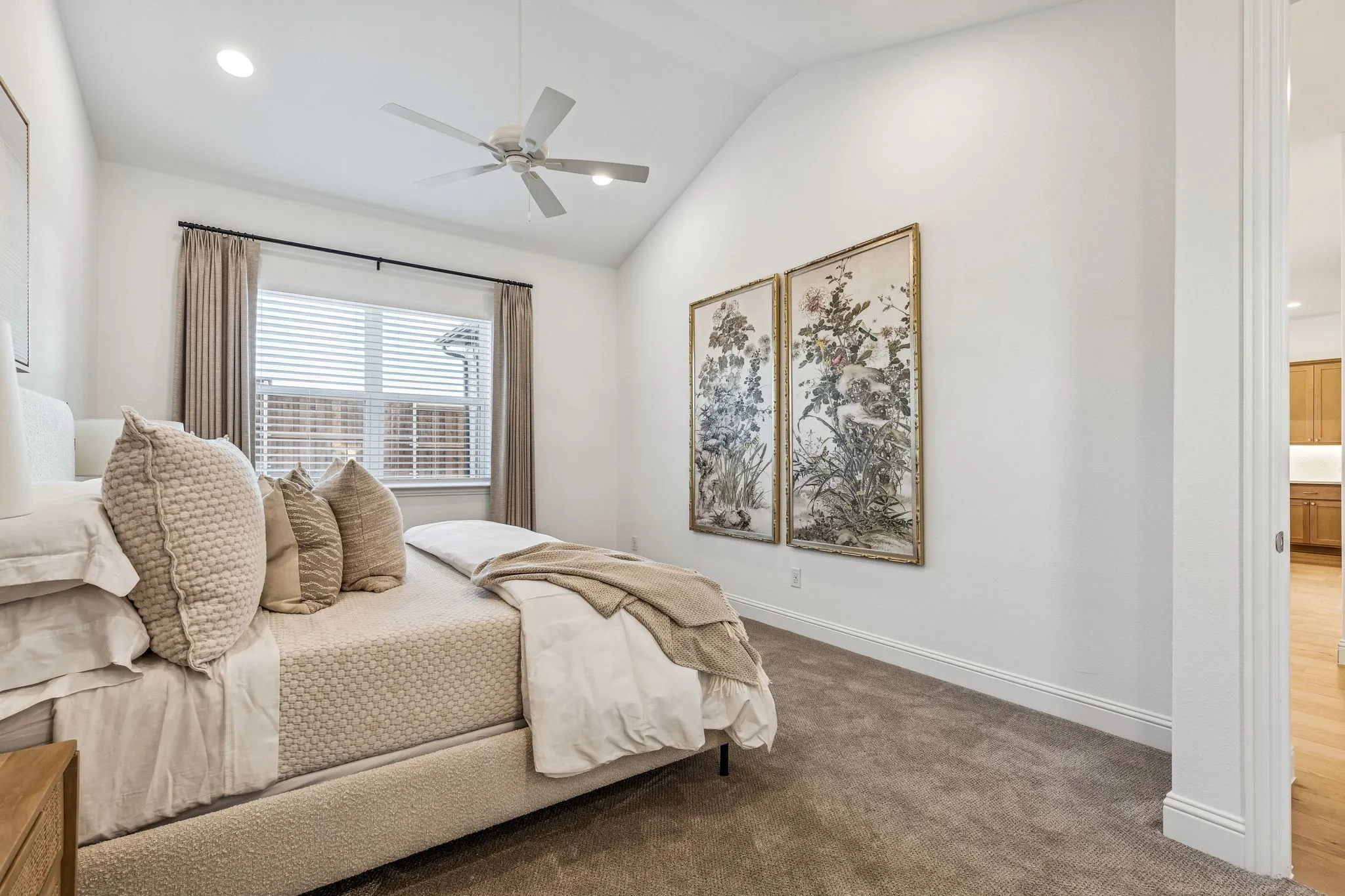 Vaulted ceiling with recessed lighting, ceiling fan, and carpeted flooring