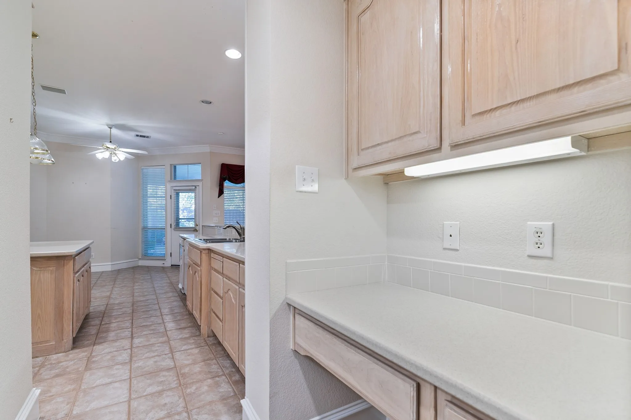 Built in desk area could be renovated into a butlers pantry