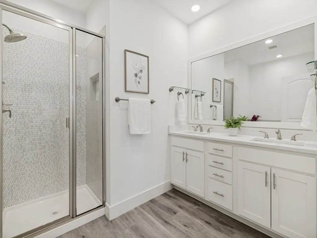 Updated Primary bath with dual sink, separate shower and tub