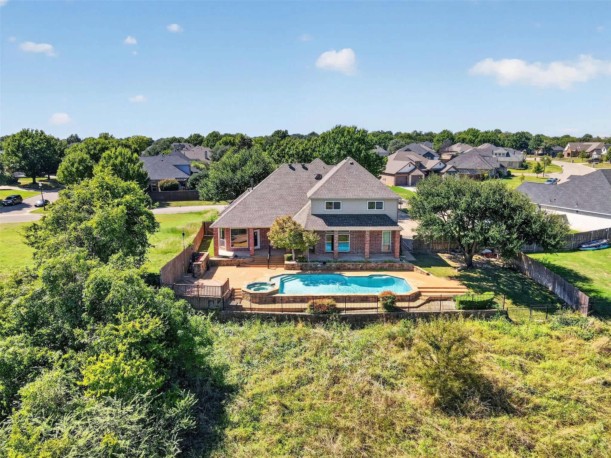 Circular driveway in front. This one-of-a-kind Cleburne custom home is not to be missed!