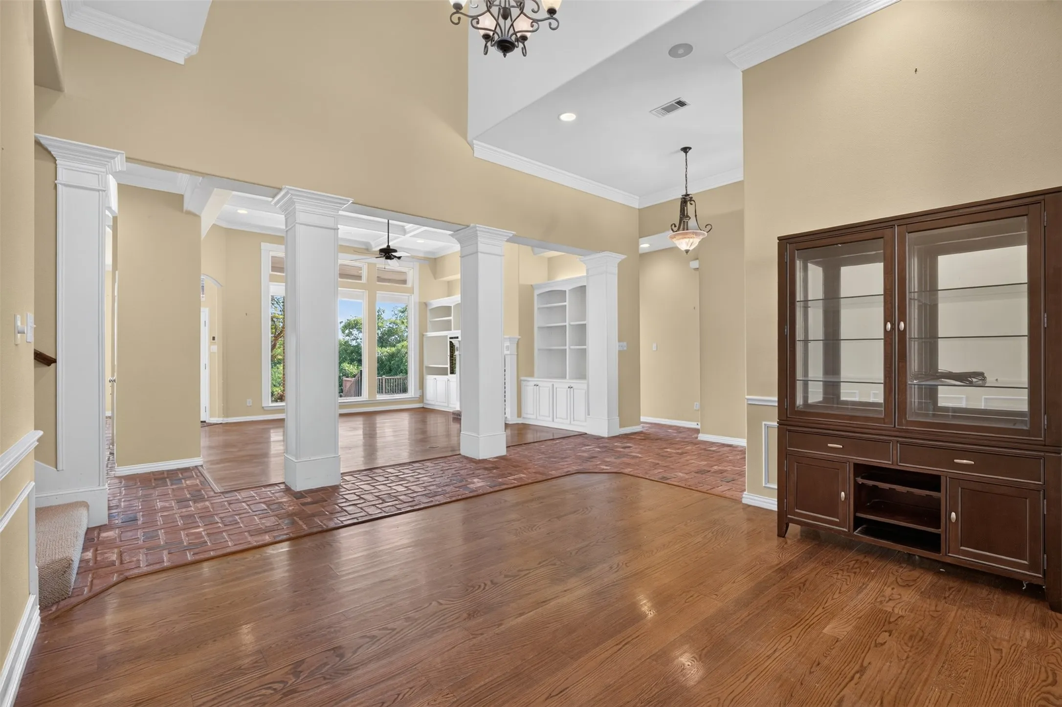 Underfoot, rich solid oak flooring and classic pavers in the kitchen add warmth and character throughout the main level.