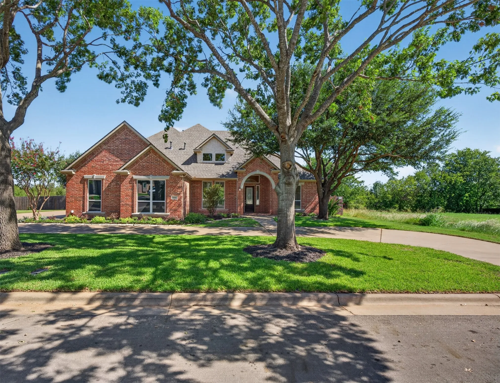 Tucked away on a picturesque lot in one of Cleburne's most sought-after neighborhoods, this exquisite custom 4 bedroom 3 bath 3 car garage home feels like a page straight out of Southern Living.