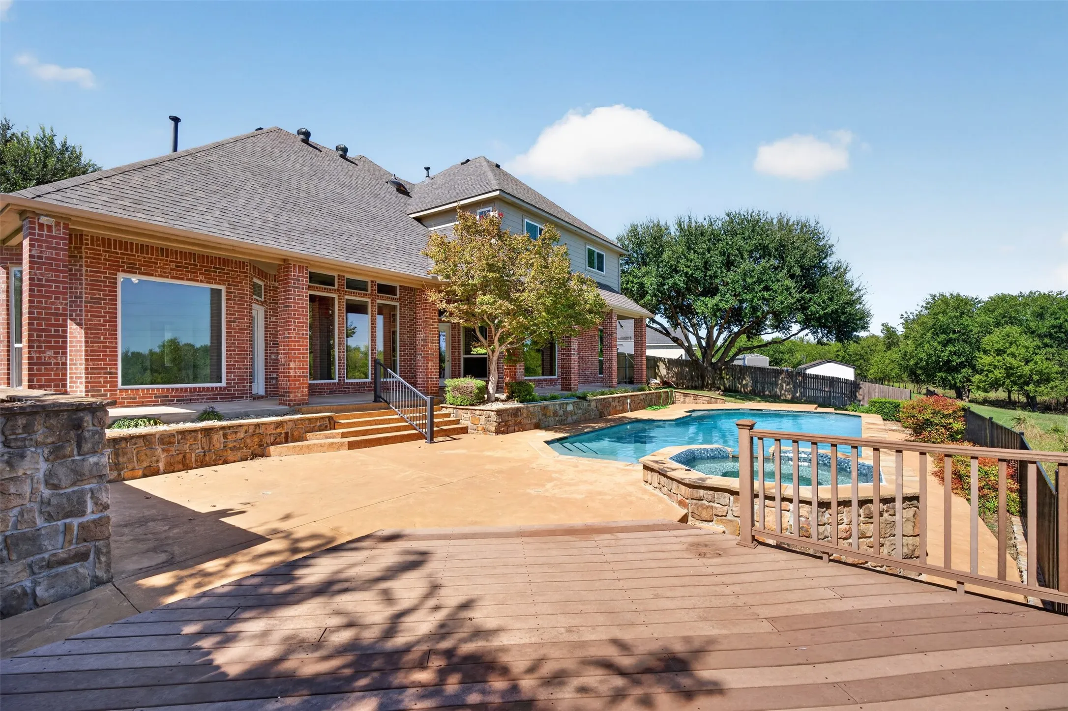 Step outside to your own backyard oasis, complete with a sparkling pool and a separate decking dining area are ideal for entertaining or unwinding while taking in the natural surroundings.