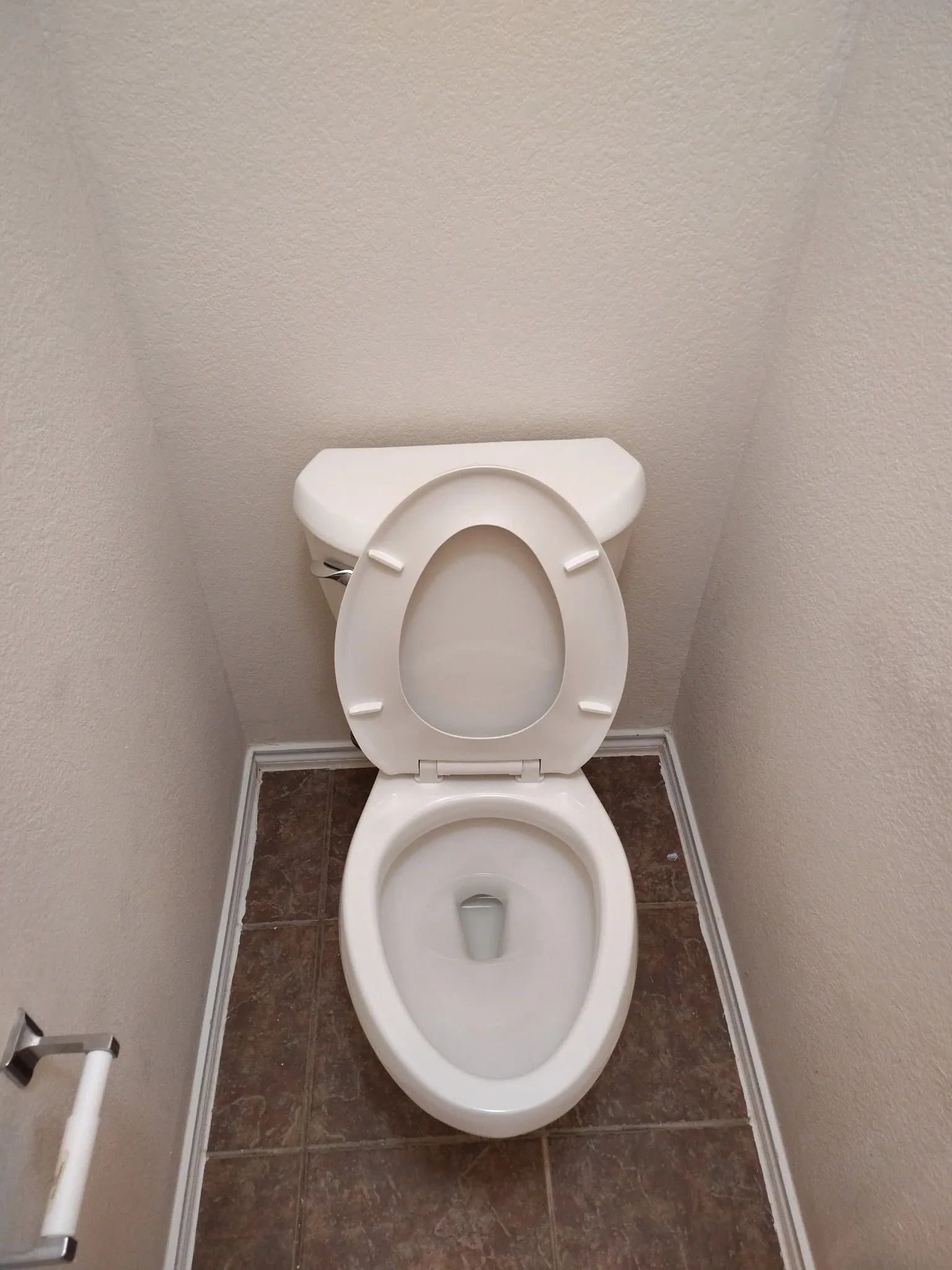 White ceramic toilet with a porcelain finish