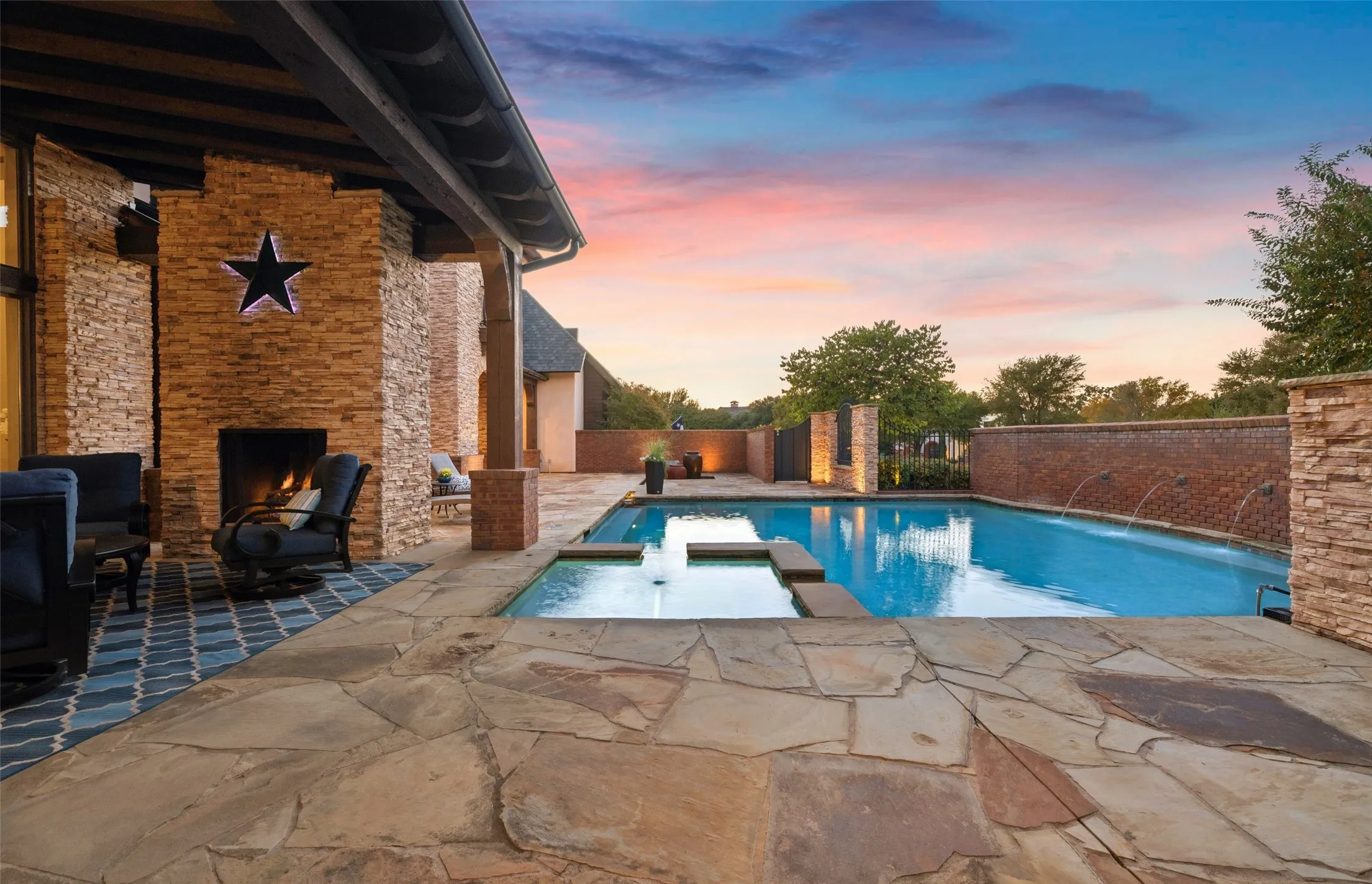 Built for seamless outdoor entertaining, the courtyard features an outdoor cooking station just steps away from multiple shaded and open-air seating zones.