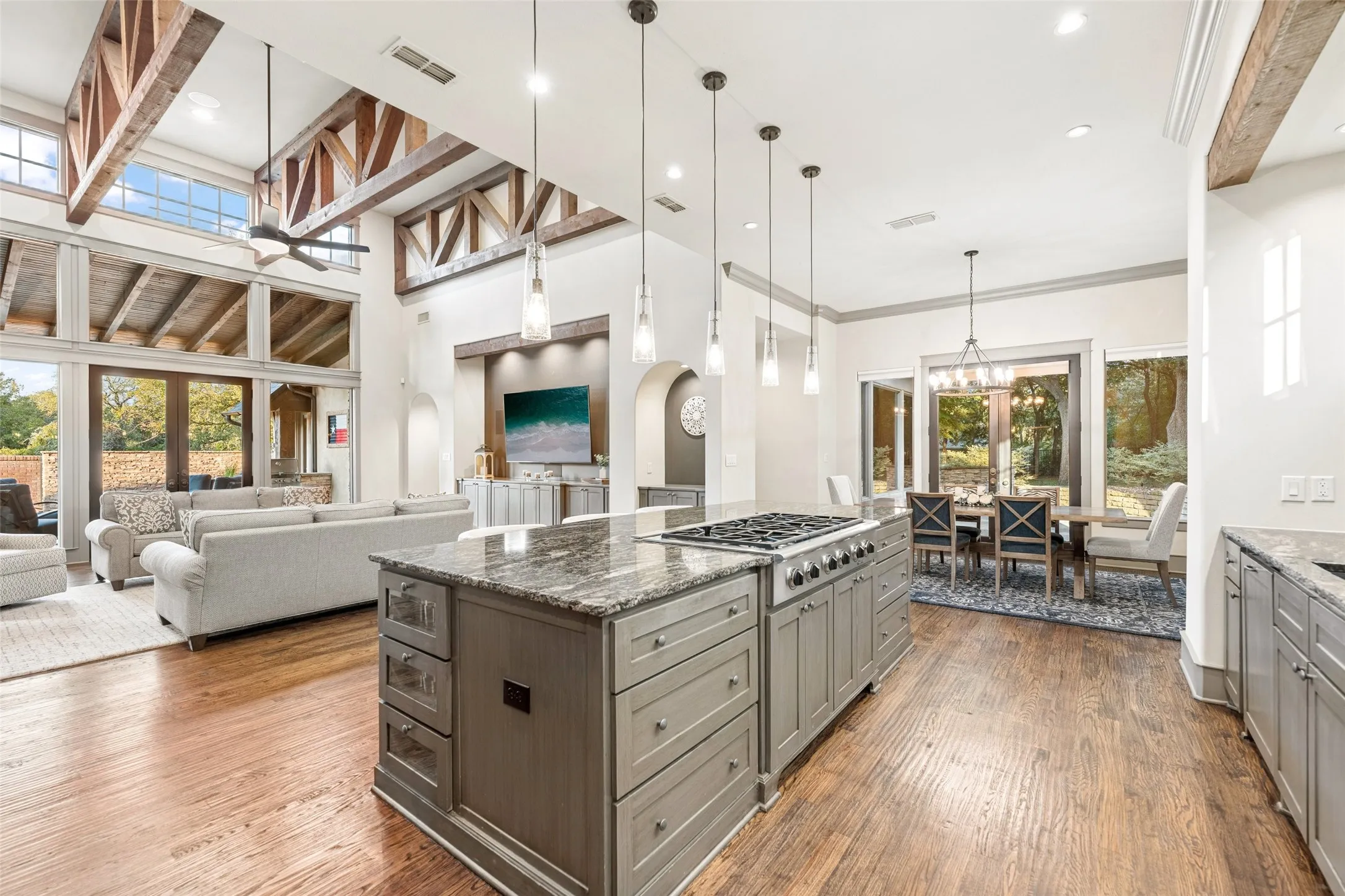Designed for effortless hosting, the open layout connects the kitchen directly to the breakfast dining nook and soaring great room