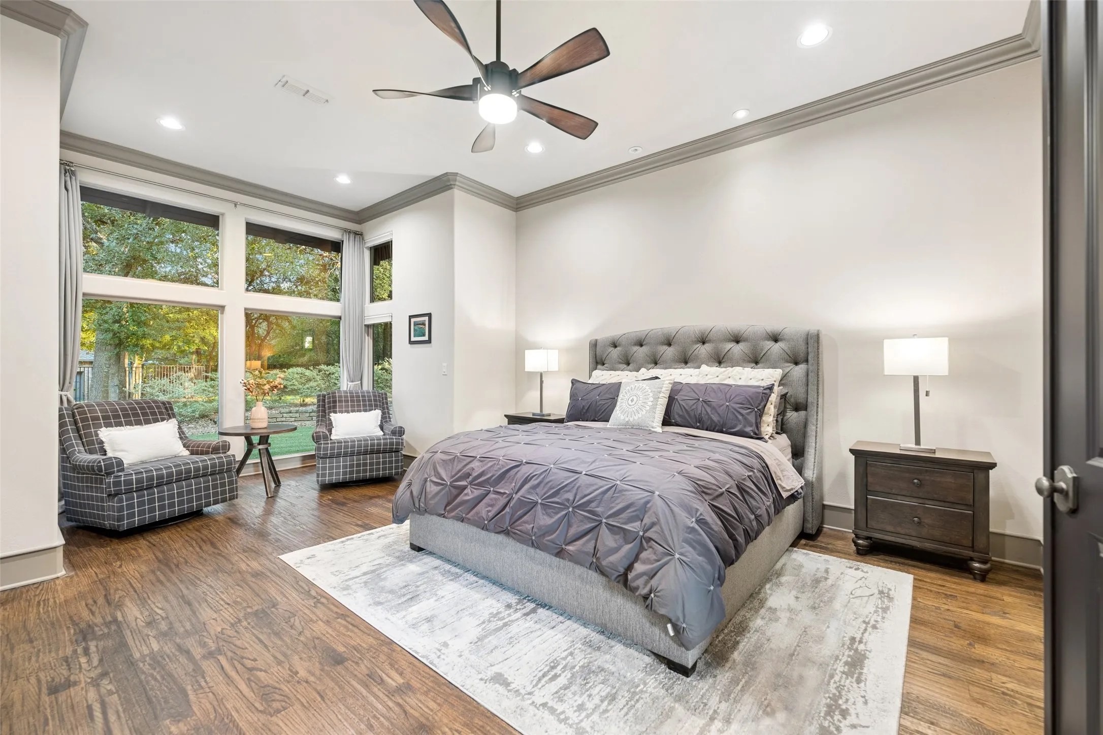 Stunning primary bedroom is a true sanctuary.