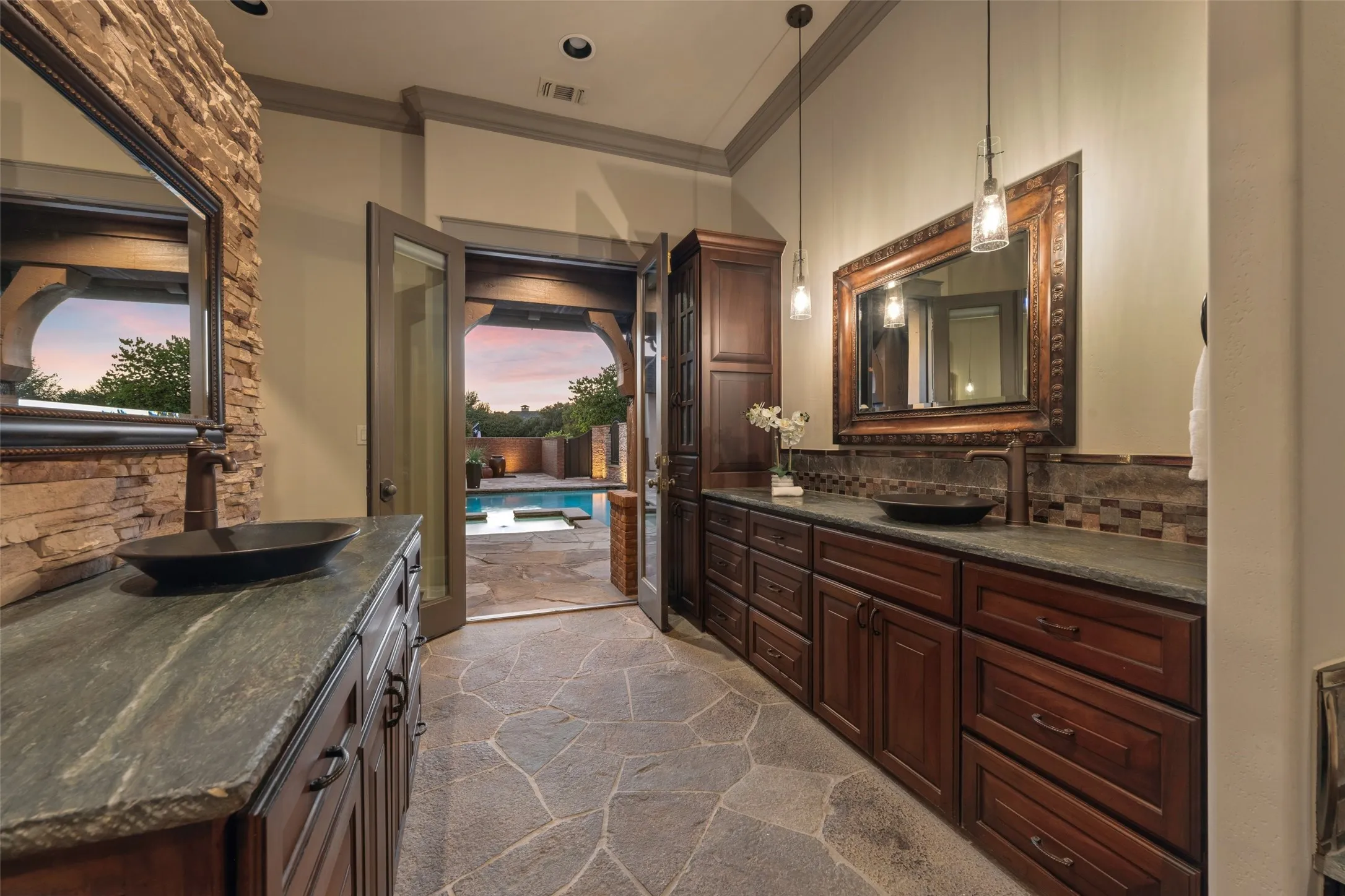 Primary bathroom with easy access to the pool plaza.