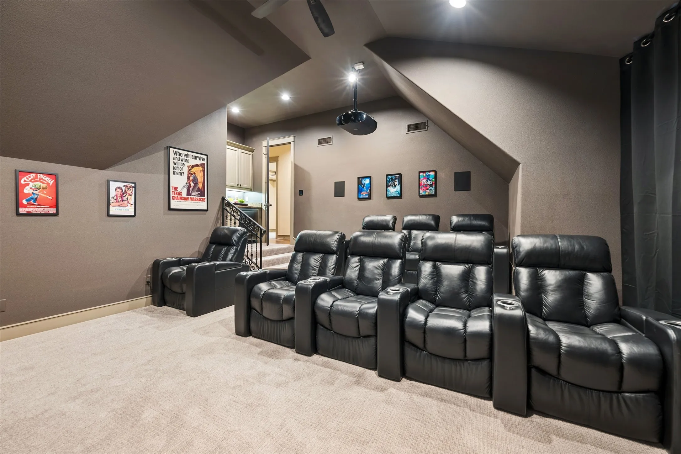2nd floor media room with tiered seating.