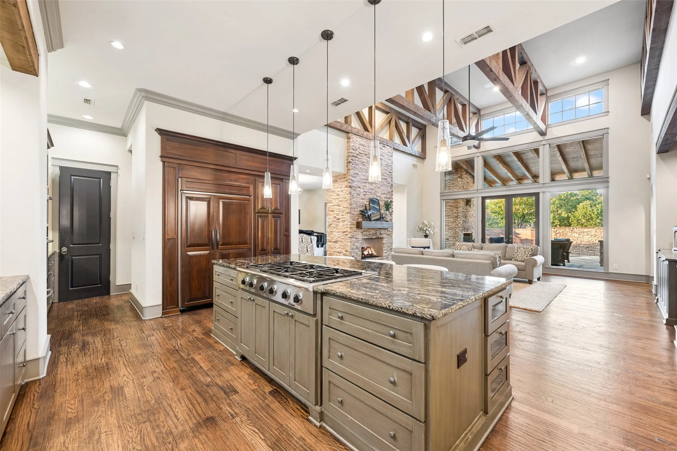 This kitchen is the heart of the home with built-in fridge and a large walk-in pantry.