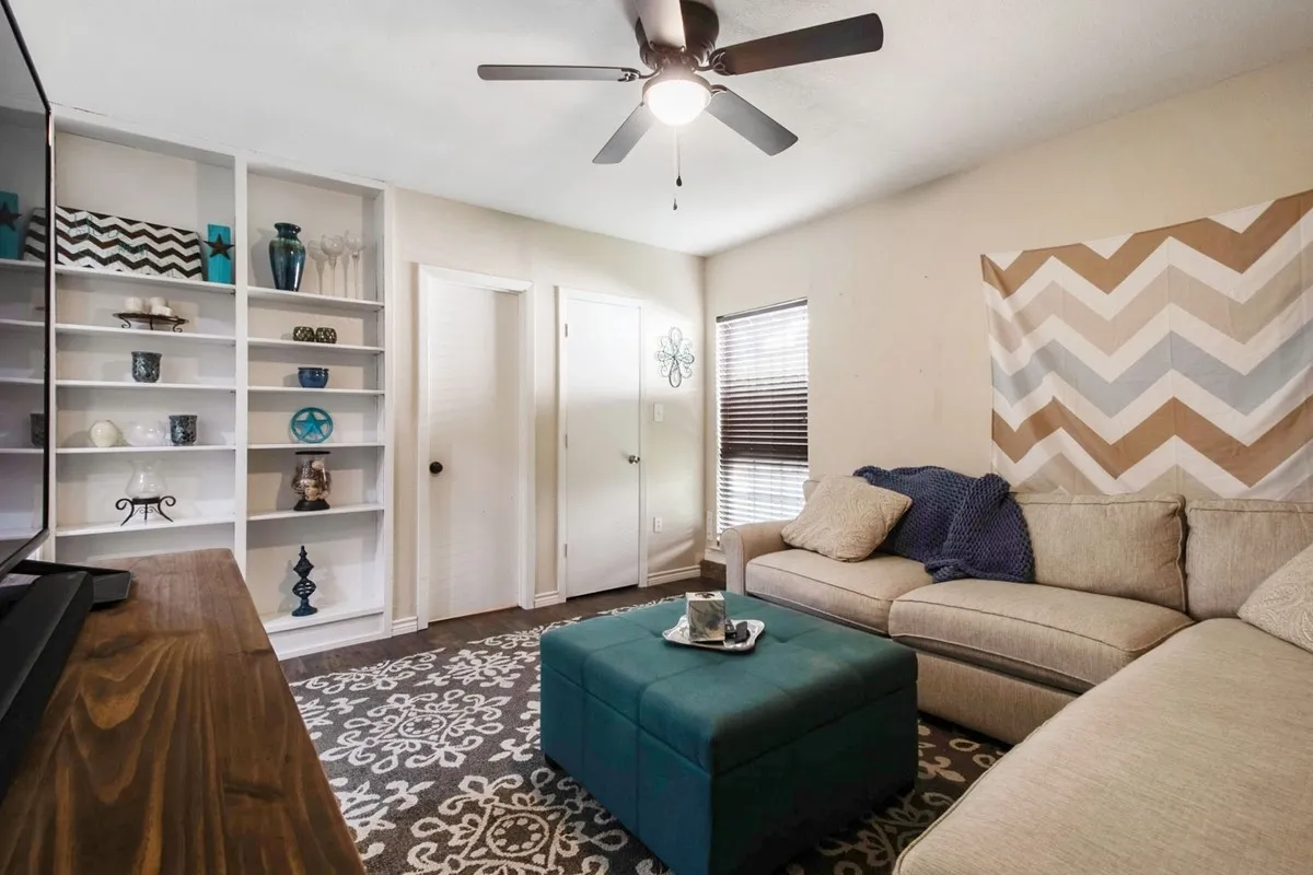 Flexible, spacious room with closet and full bath. Currently used as a second living space.