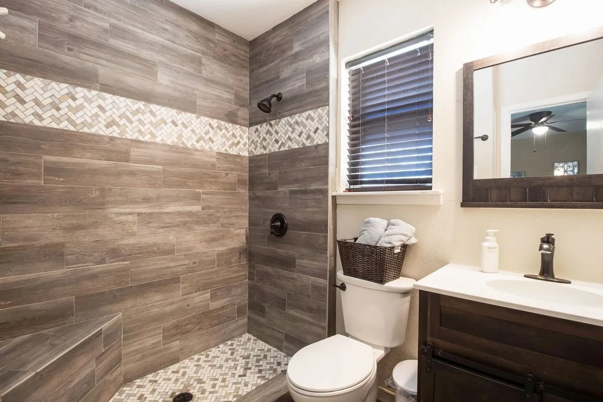 Updated full bath ensuite in bonus room.