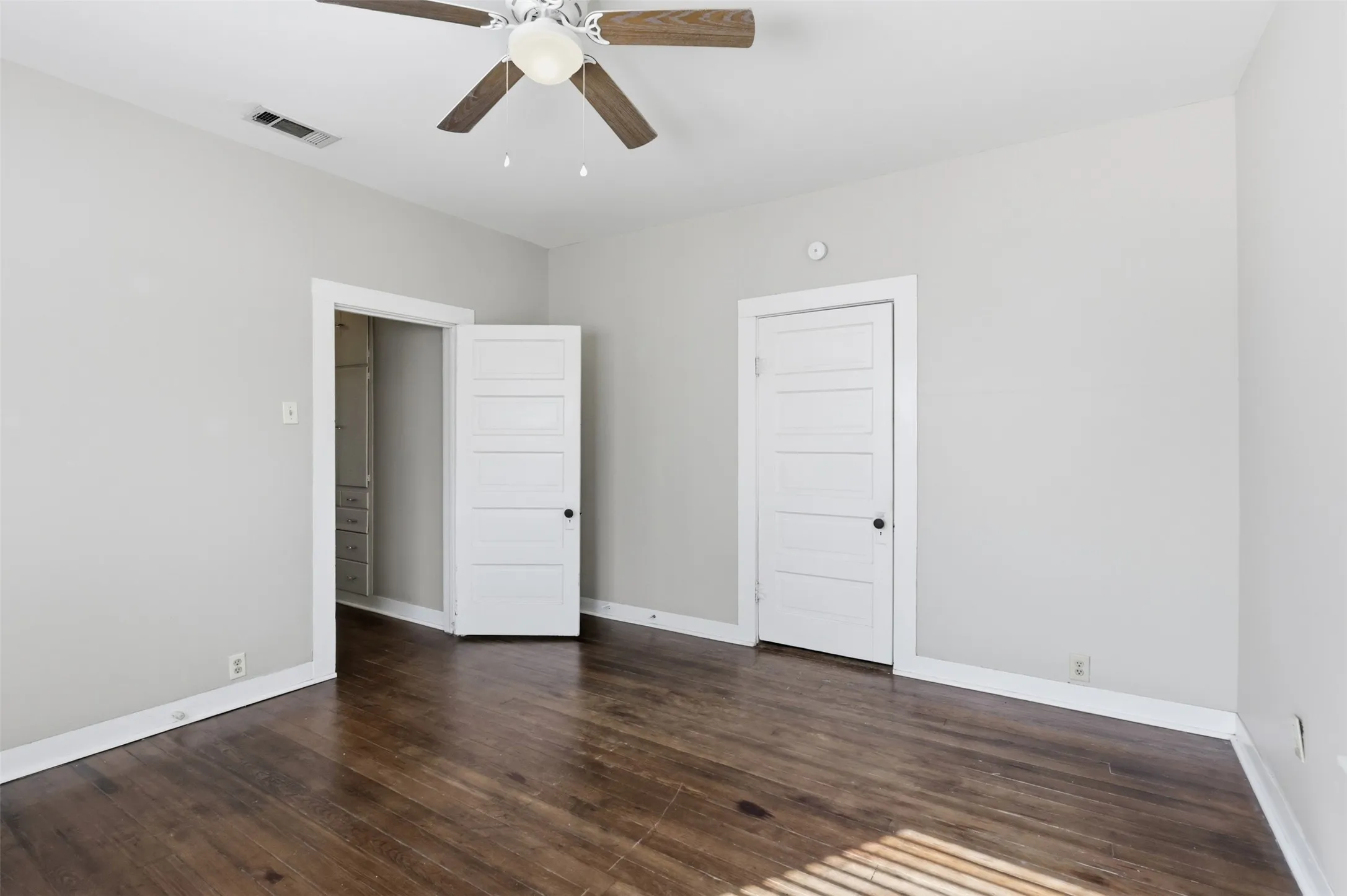 Wood-finish flooring with white trim