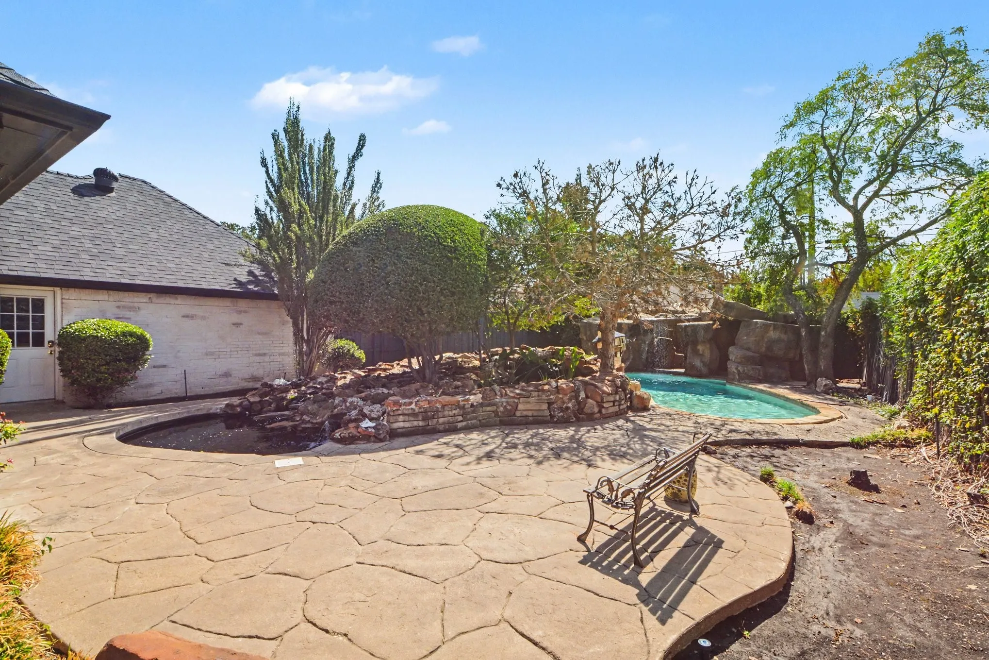 Koi pond with waterfall and pool