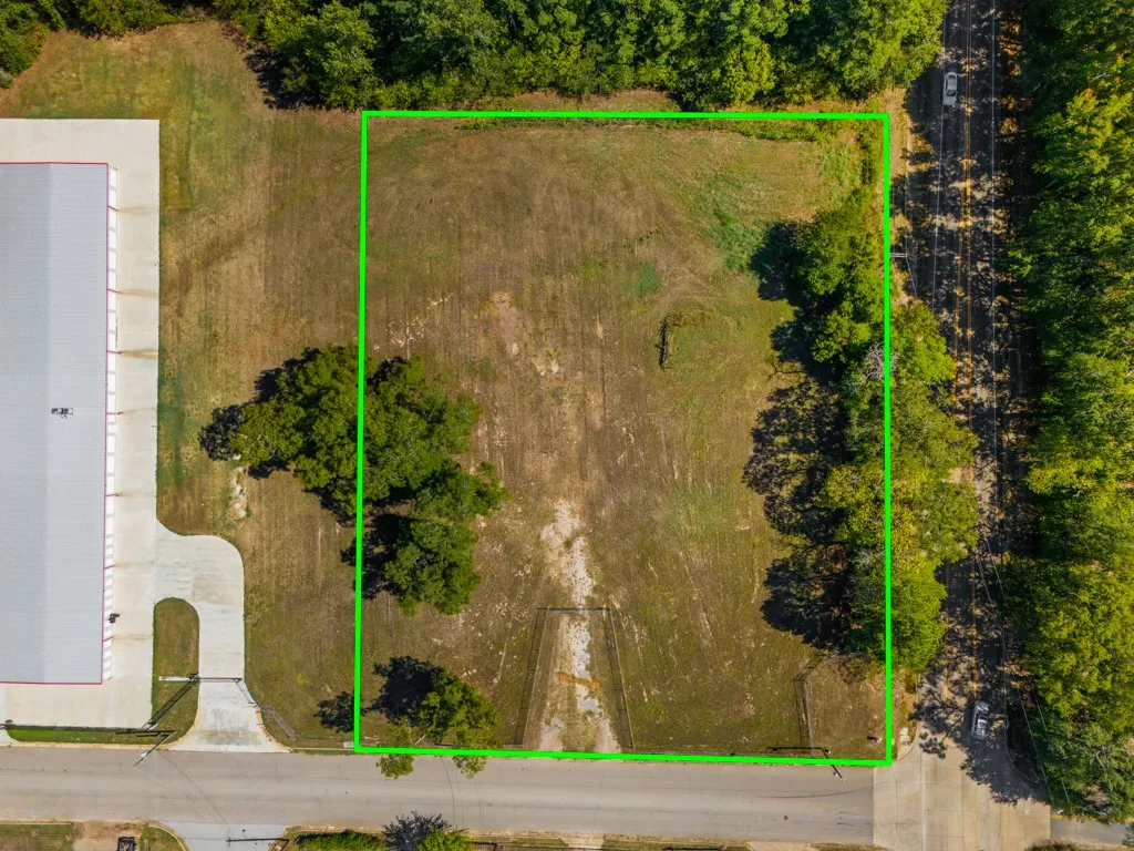 Expansive cleared lot with mature trees
