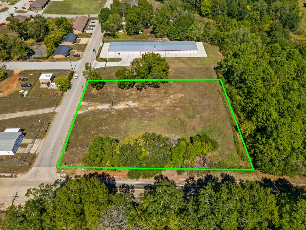 Cleared lot with street frontage and mature perimeter trees