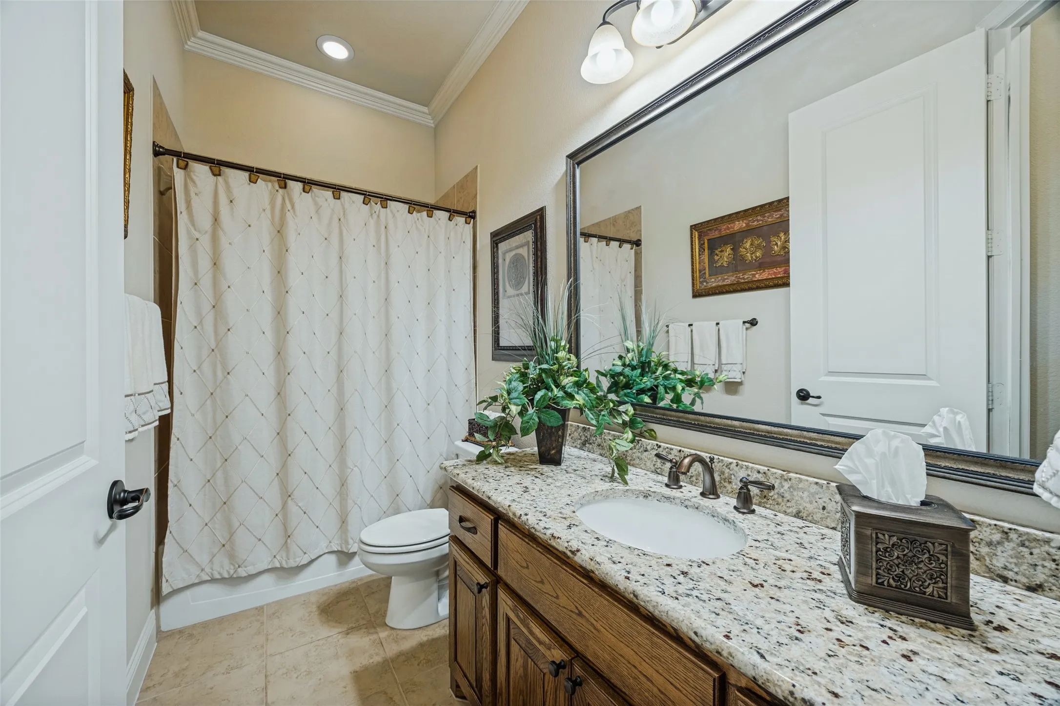 Downstairs full bath adjoins the "office" bedroom.