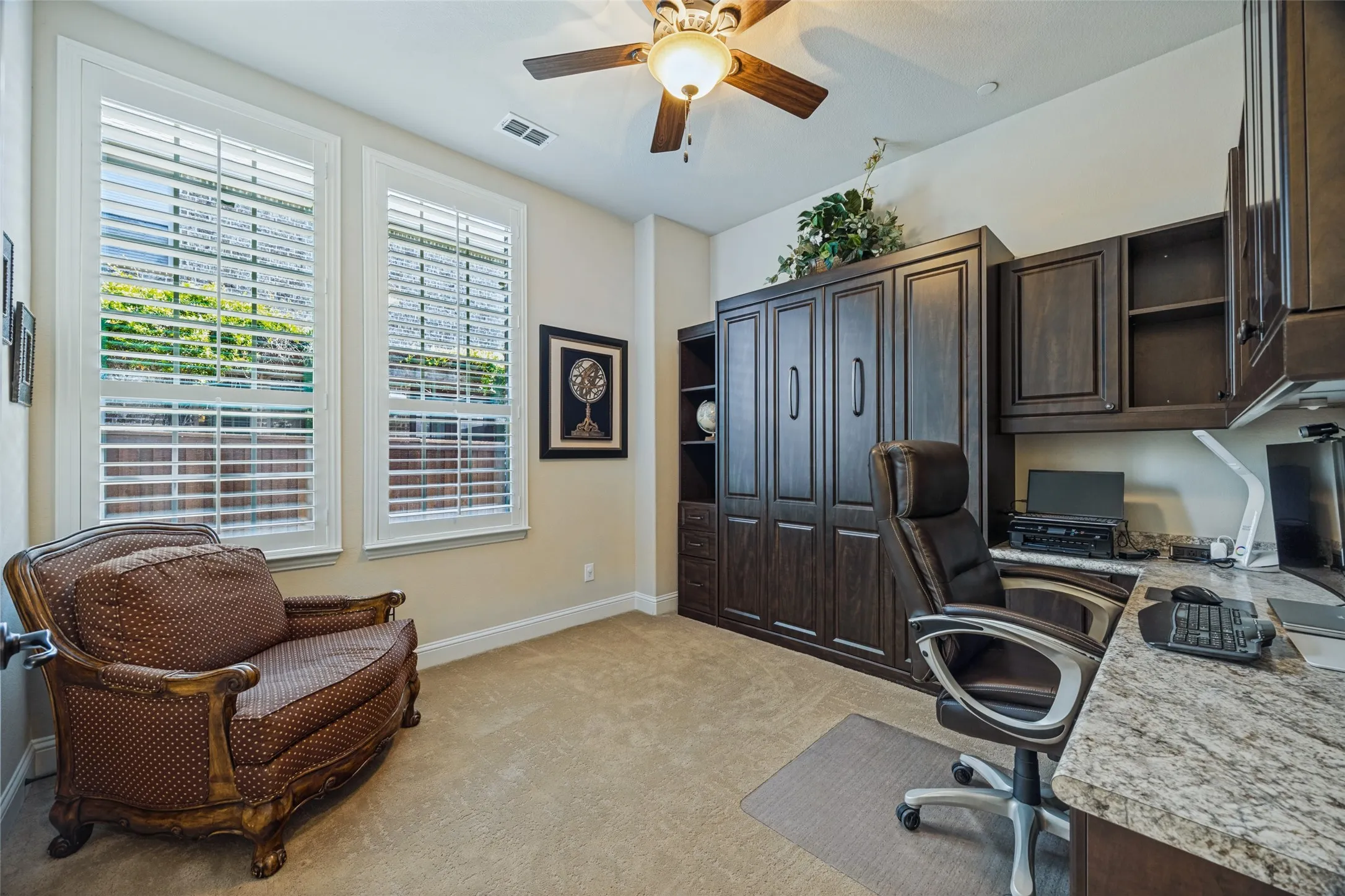 The downstairs bedroom is currently configured as a home office but the Murphy Bed turns it into a guest bedroom!