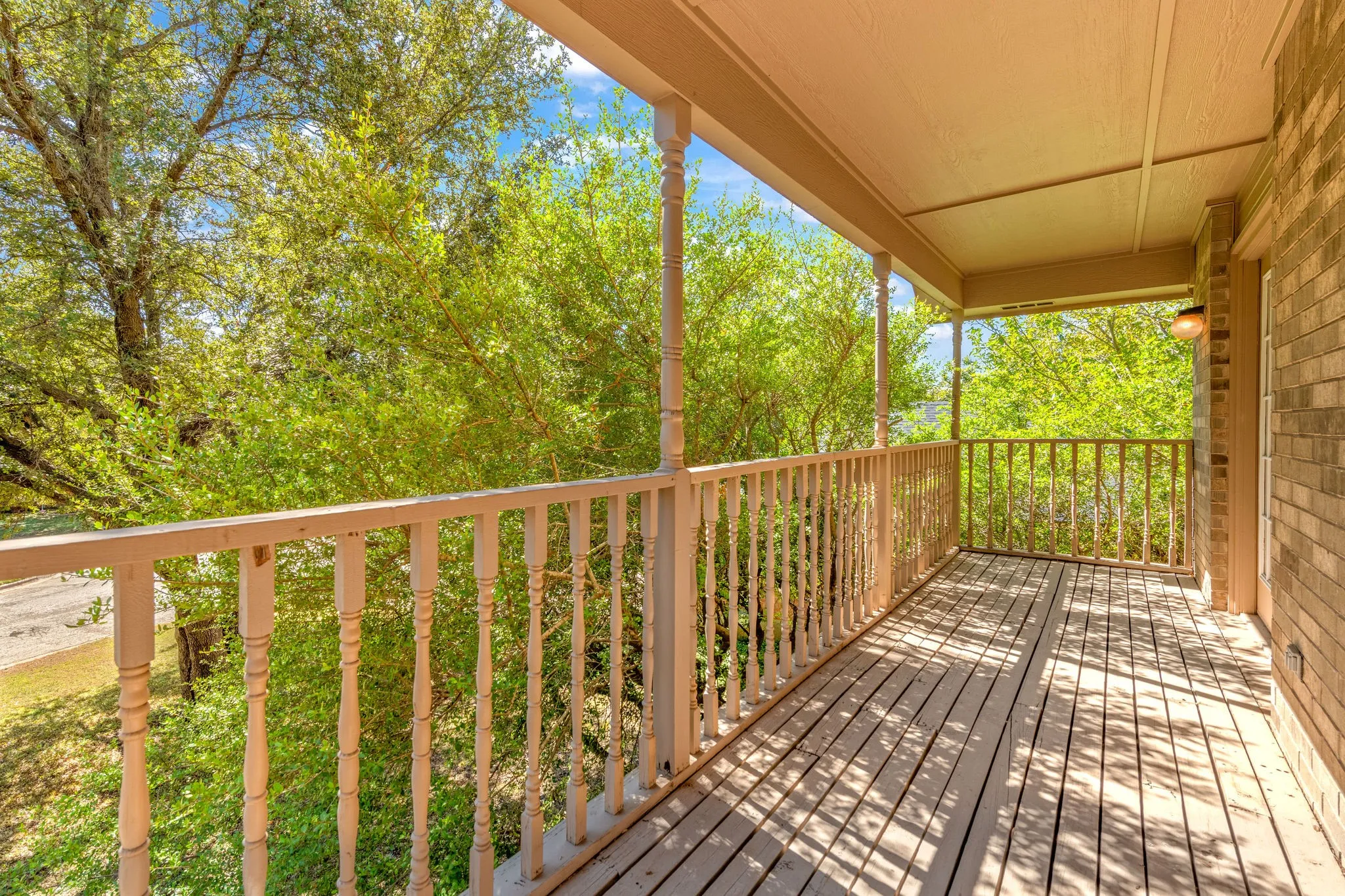 Balcony off primary bedroom.  Perfect place to enjoy the peace and quiet.
