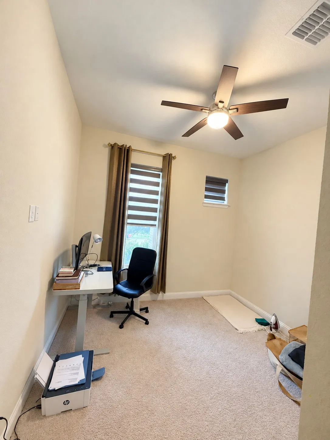 Wall-to-wall carpeting with neutral wall finishes