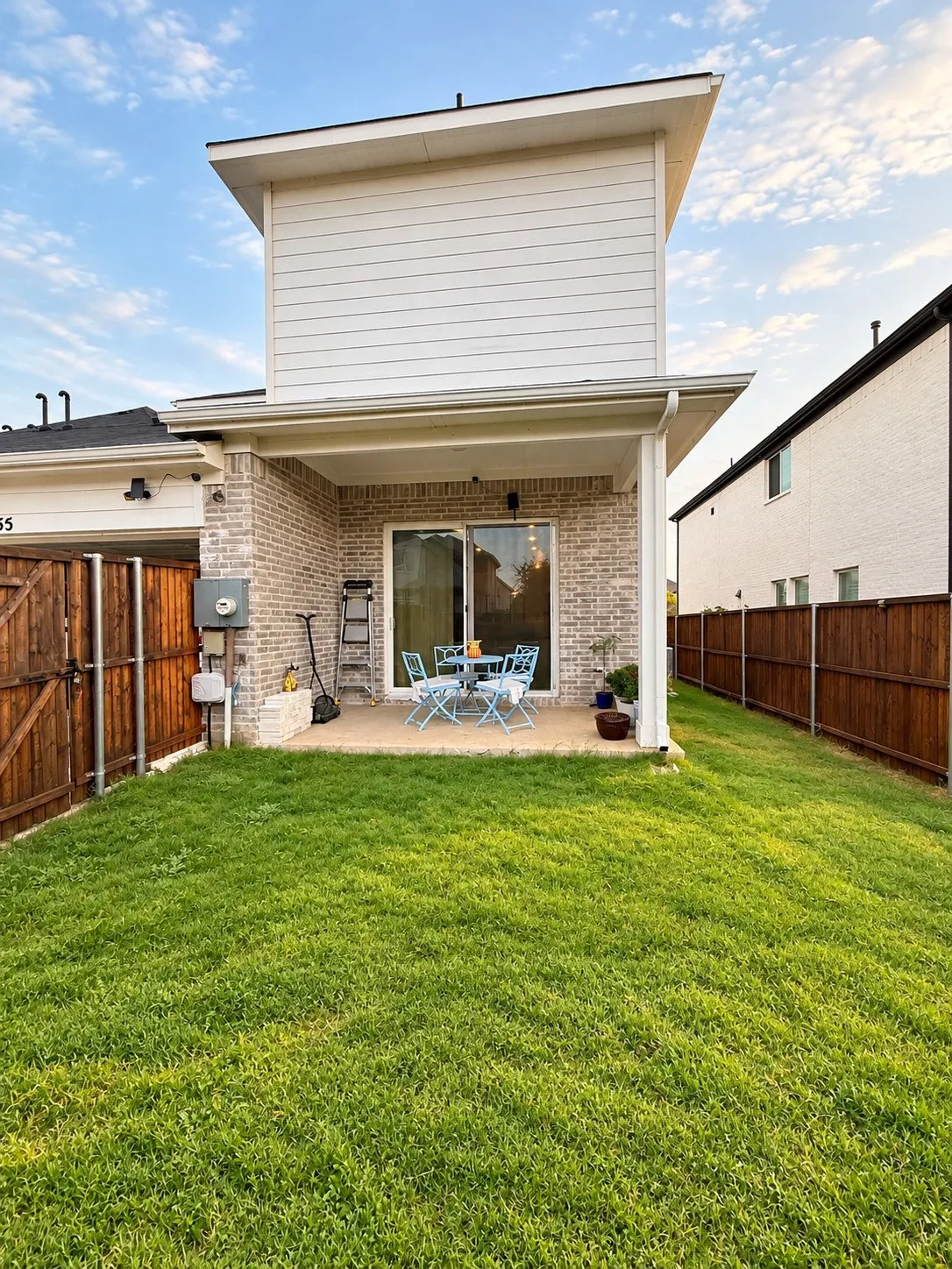 Expansive green space with wood fencing