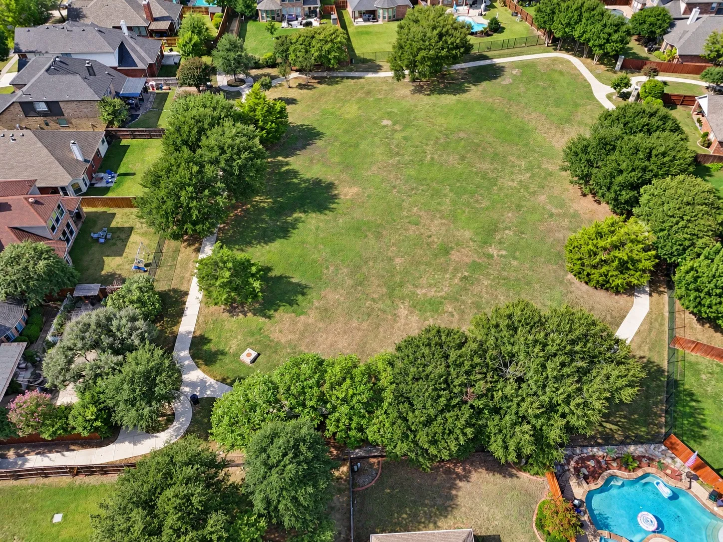 Green belt and walking trail directly accessible from backyard gate