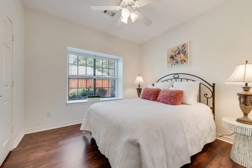 Guest bedroom on first floor with adjacent full bath.