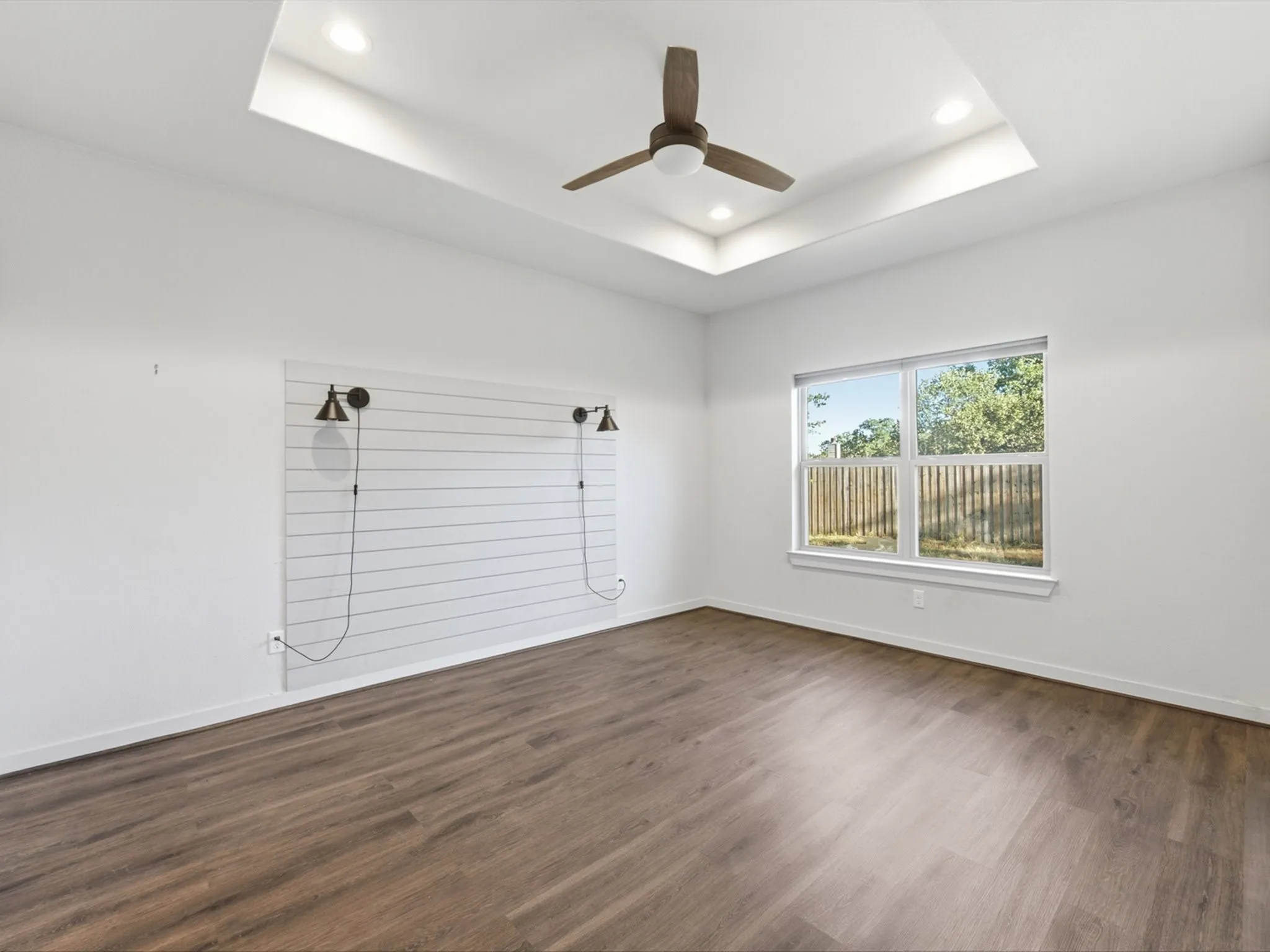 tiered ceiling adds a little extra something to the space