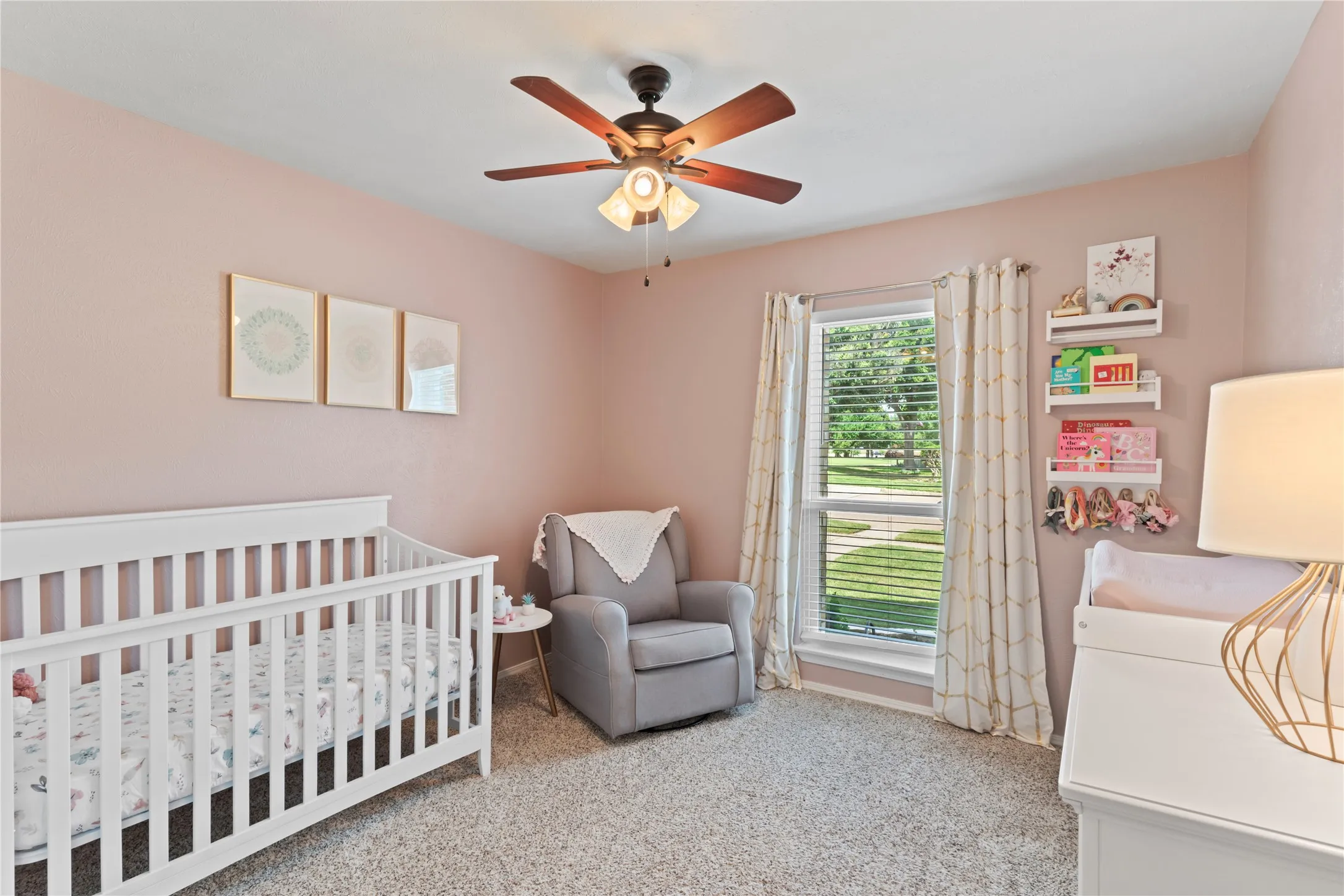 Bedroom 3 with plenty of natural light and ceiling fan.