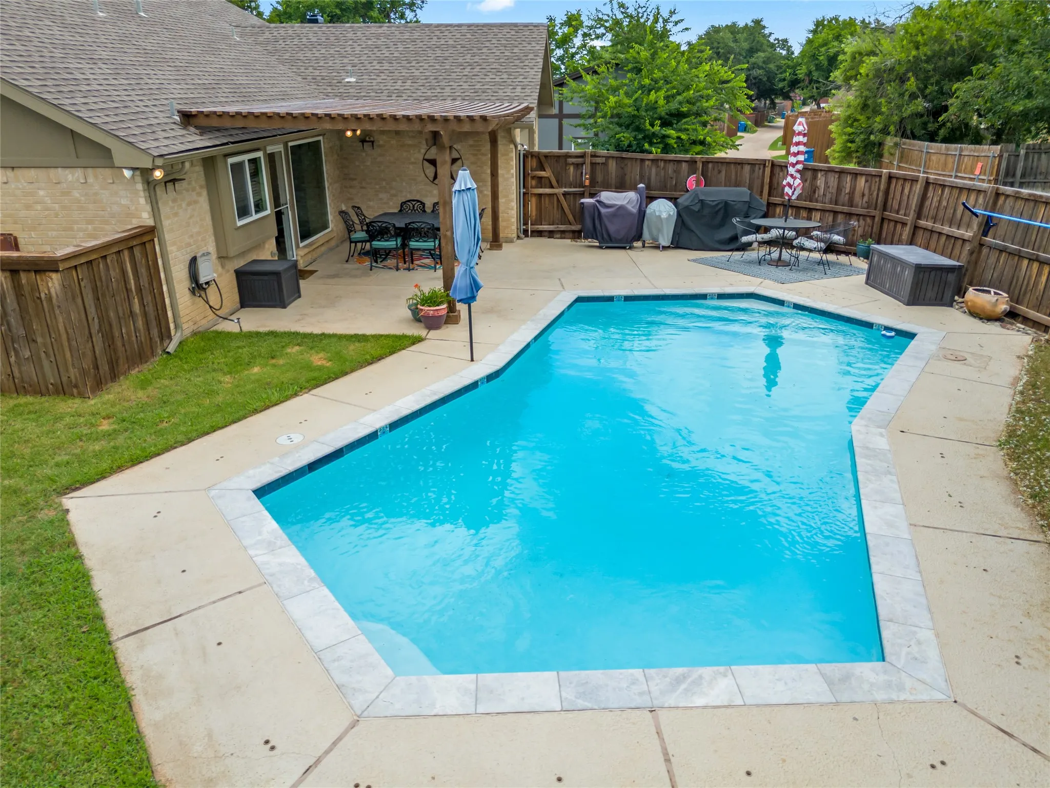 Sparkling blue pool ready for fun and entertaining