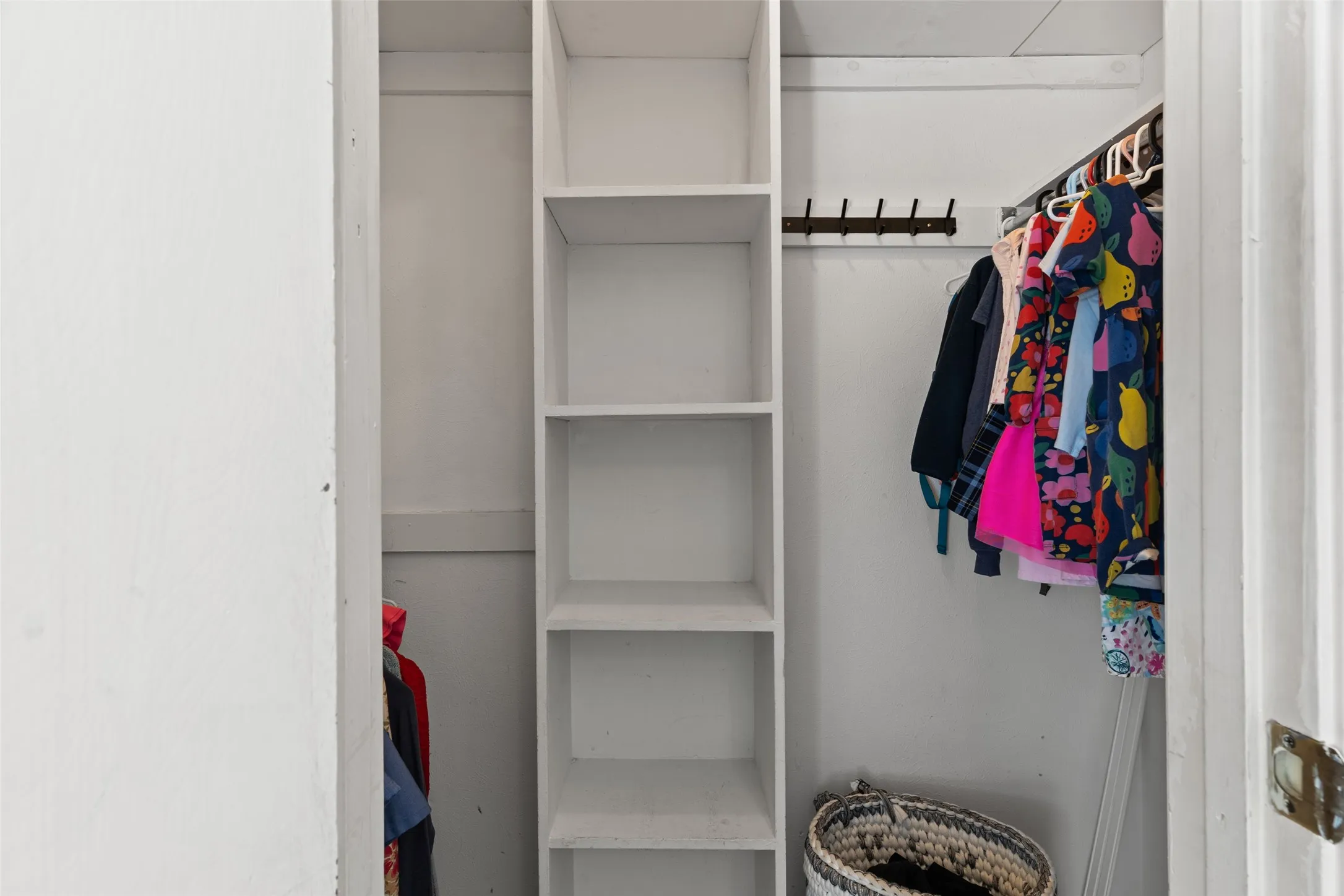 Integrated shelving system, clothes rod, and wall-mounted coat rack