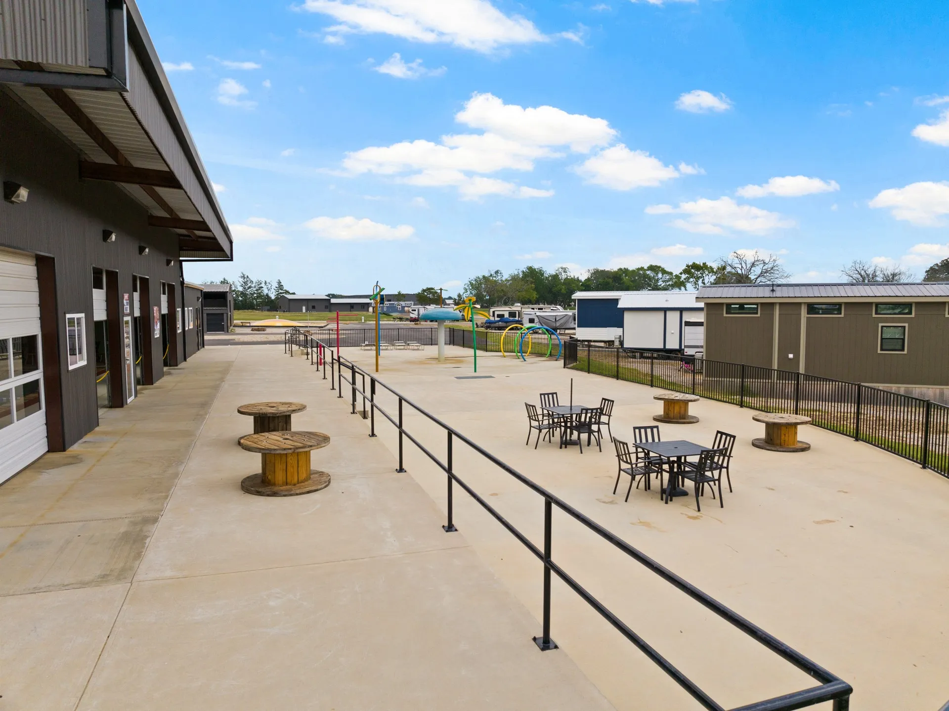 Surrounding community featuring outdoor dining space and a patio