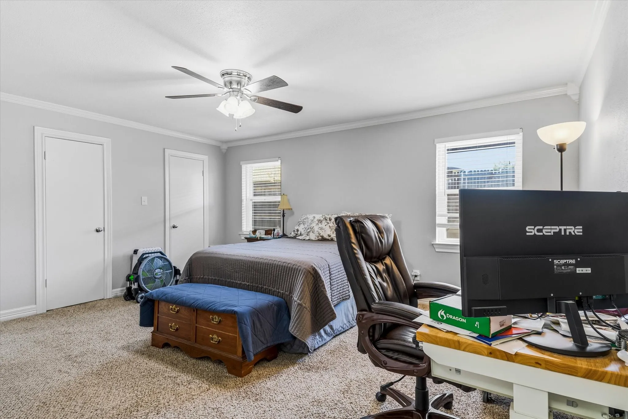 Neutral-toned walls complement plush carpeting