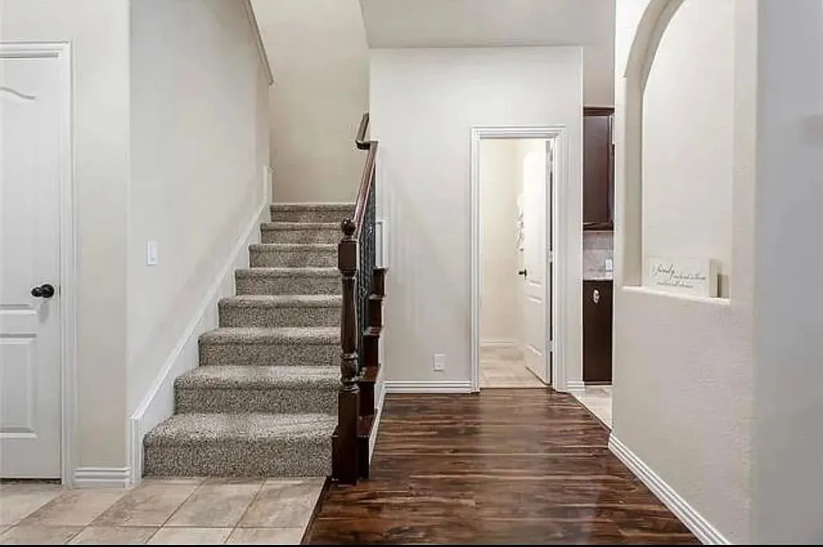 Stairs with wood-type flooring