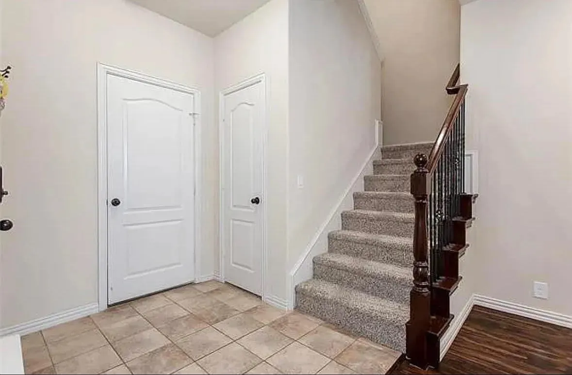Stairway featuring tile patterned flooring