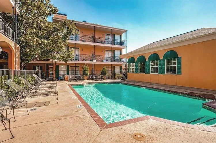Community pool and club house, New Orleans style court yard..