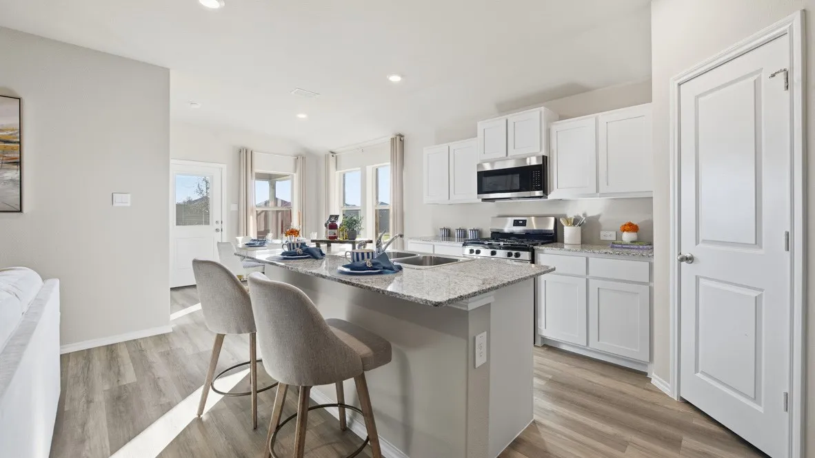 Kitchen - All Home and community information, including pricing, included features, terms, availability and amenities, are subject to change at any time without notice or obligation. All Drawings, pictures, photographs, video, square footages, floor plans, elevations, features, colors and sizes are approximate for illustration purposes only and will vary from the homes as built.
