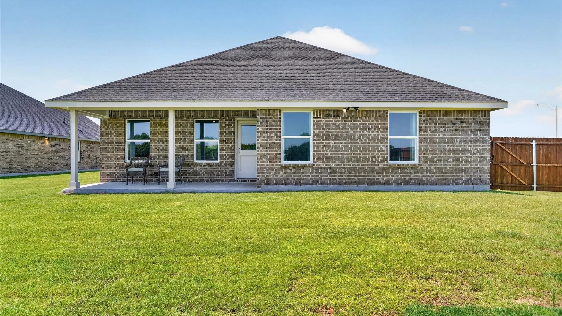 Rear Elevation - All Home and community information, including pricing, included features, terms, availability and amenities, are subject to change at any time without notice or obligation. All Drawings, pictures, photographs, video, square footages, floor plans, elevations, features, colors and sizes are approximate for illustration purposes only and will vary from the homes as built.