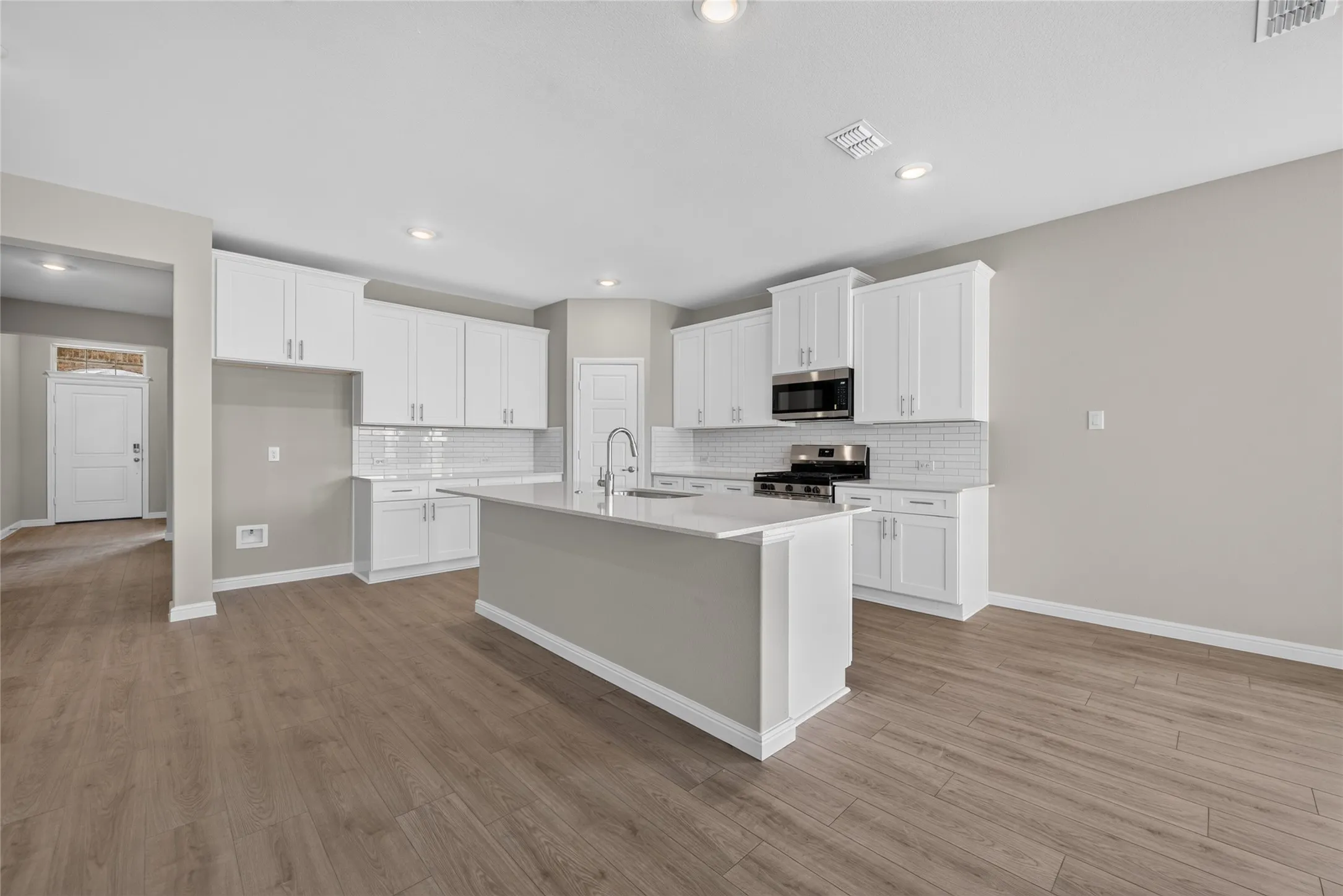 Kitchen - All Home and community information, including pricing, included features, terms, availability and amenities, are subject to change at any time without notice or obligation. All Drawings, pictures, photographs, video, square footages, floor plans, elevations, features, colors and sizes are approximate for illustration purposes only and will vary from the homes as built.
