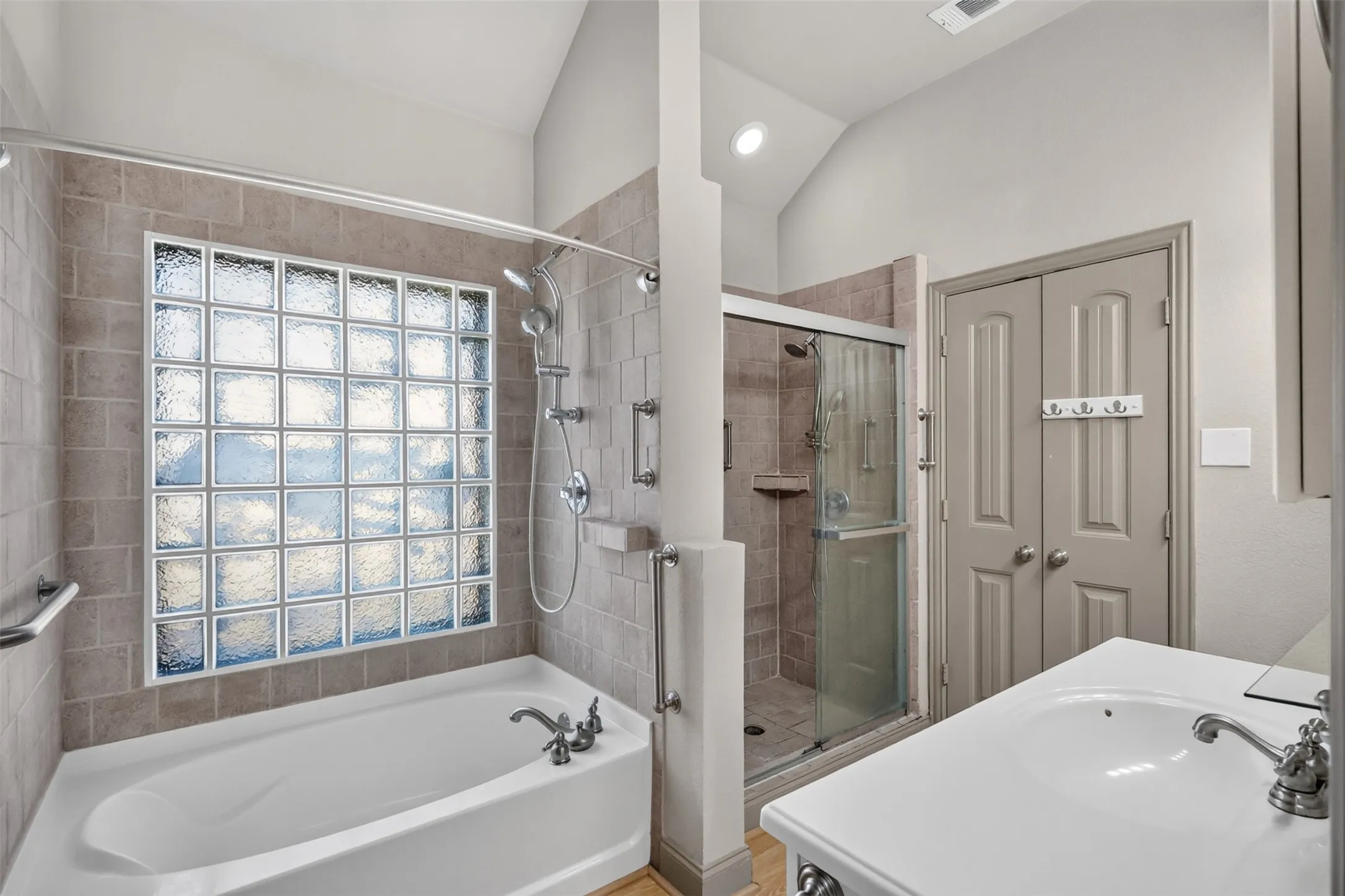 PRIMARY BATHROOM GARDEN TUB AND SEPARATE WALK-IN SHOWER