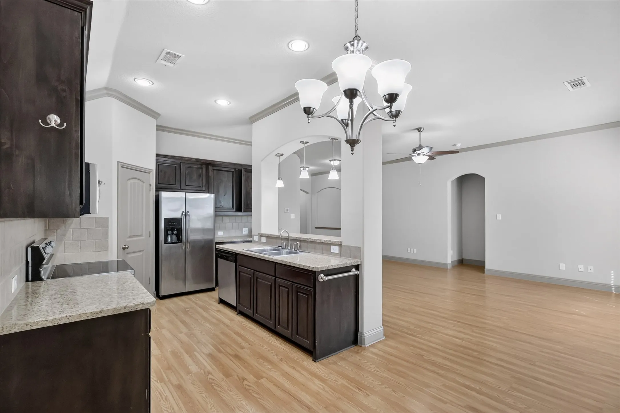 KITCHEN OPEN TO THE LIVING ROOM